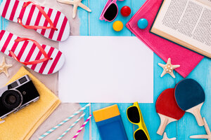 flat-lay-traveler-accessories-blue-background-with-blank-copyspace-top-view-summer_(c)_denamorado_freepik