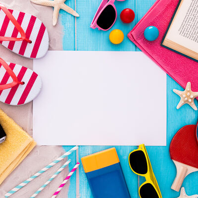 flat-lay-traveler-accessories-blue-background-with-blank-copyspace-top-view-summer_(c)_denamorado_freepik